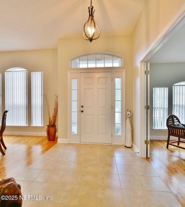 2612 S Waterleaf Dr, Saint Augustine, FL 32092 - foyer entrance featuring light tile patterned floors and baseboards