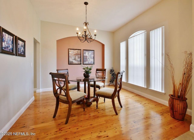 2612 S Waterleaf Dr, Saint Augustine, FL 32092 - dining space featuring light wood-type flooring, a chandelier, and baseboards