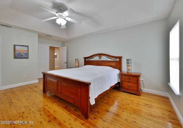 2612 S Waterleaf Dr, Saint Augustine, FL 32092 - bedroom with light wood-style floors, baseboards, and a ceiling fan
