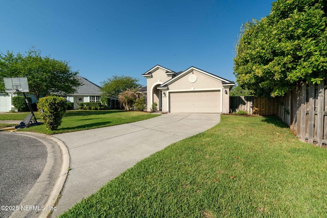 single story home featuring a front yard, a garage, concrete driveway, fence, and stucco siding