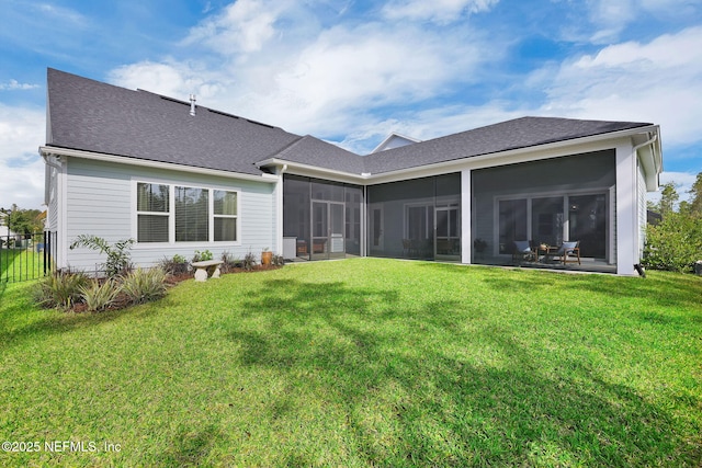 52 Sunshine Bass Ct, Ponte Vedra, FL 32081 - rear view of property featuring a sunroom, a yard, a shingled roof, and fence