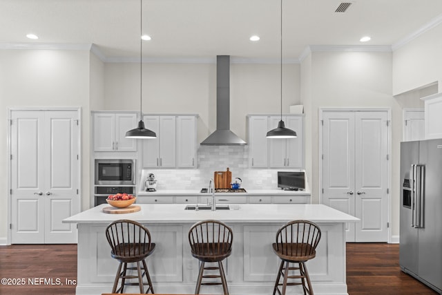 441 Anthem Ridge Dr, Ponte Vedra, FL 32081 - kitchen featuring visible vents, a sink, wall chimney range hood, appliances with stainless steel finishes, and crown molding