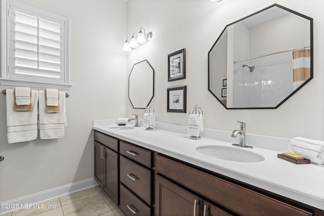 441 Anthem Ridge Dr, Ponte Vedra, FL 32081 - full bathroom with double vanity, a sink, tile patterned flooring, and baseboards