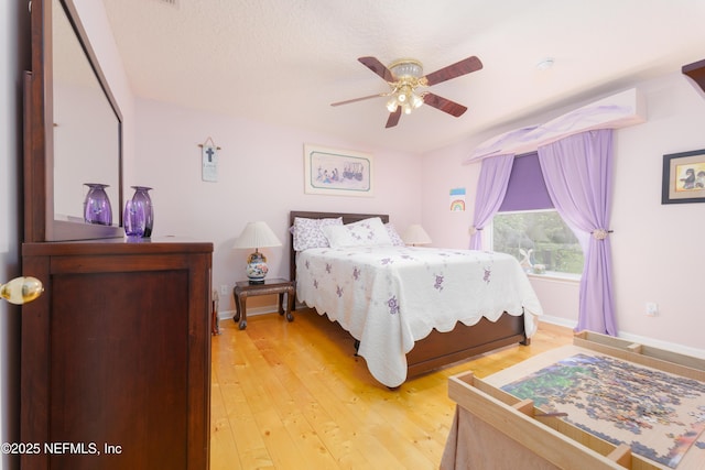 13772 Chipperfield Ln, Jacksonville, FL 32226 - bedroom featuring light wood finished floors, baseboards, and a ceiling fan