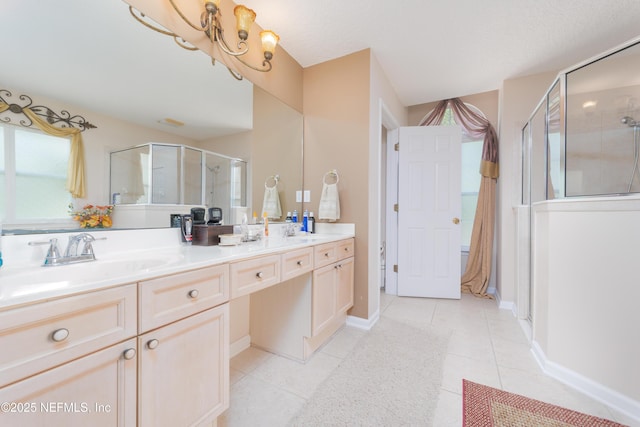 13772 Chipperfield Ln, Jacksonville, FL 32226 - full bathroom with double vanity, a shower stall, tile patterned flooring, and a sink