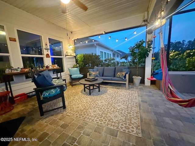 view of patio / terrace with outdoor lounge area and a ceiling fan