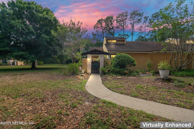 765 Sea Oats Bay, Ponte Vedra Beach, FL 32082 - view of front of house featuring a lawn and stucco siding