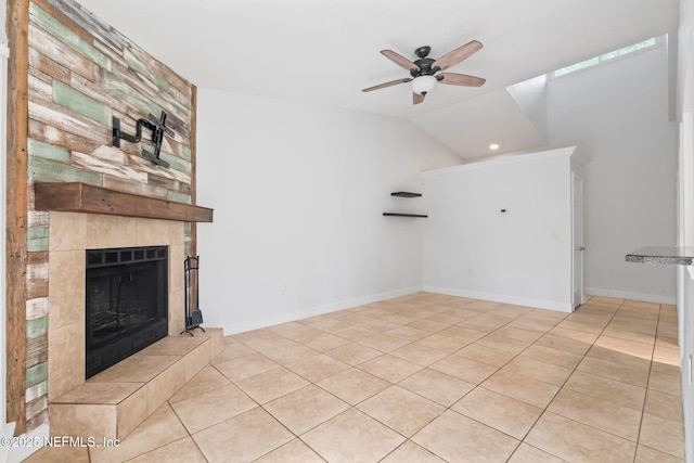 765 Sea Oats Bay, Ponte Vedra Beach, FL 32082 - unfurnished living room with light tile patterned flooring, a fireplace, a ceiling fan, baseboards, and vaulted ceiling