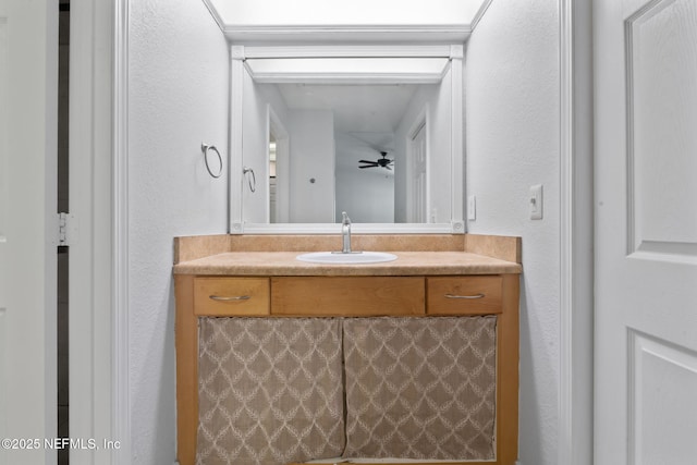 765 Sea Oats Bay, Ponte Vedra Beach, FL 32082 - bathroom featuring vanity, a textured wall, and ceiling fan