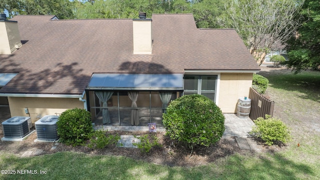 765 Sea Oats Bay, Ponte Vedra Beach, FL 32082 - back of property featuring stucco siding, central AC, and a chimney