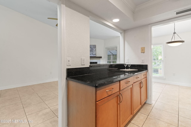 810 Sandpiper Ln, Ponte Vedra Beach, FL 32082 - kitchen with recessed lighting, baseboards, light tile patterned floors, visible vents, and ornamental molding