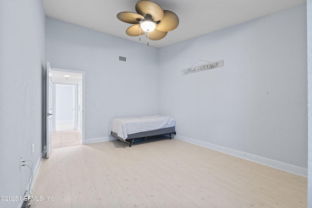 810 Sandpiper Ln, Ponte Vedra Beach, FL 32082 - unfurnished bedroom featuring baseboards, a ceiling fan, wood finished floors, and visible vents