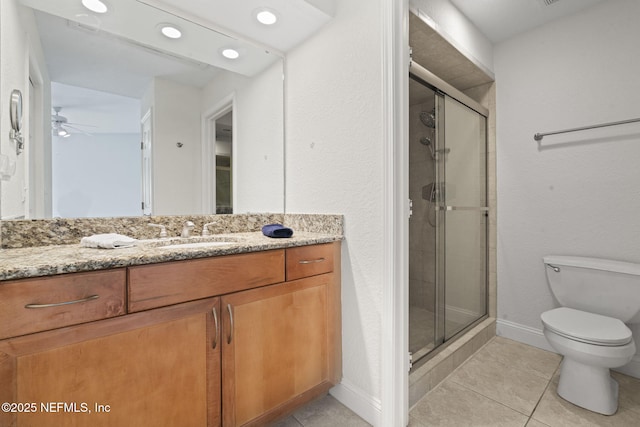 810 Sandpiper Ln, Ponte Vedra Beach, FL 32082 - bathroom with toilet, tile patterned floors, a ceiling fan, baseboards, and a shower stall