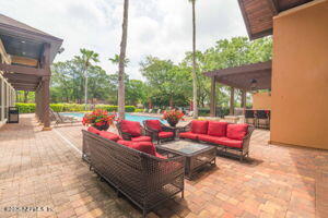810 Sandpiper Ln, Ponte Vedra Beach, FL 32082 - view of patio / terrace featuring an outdoor living space and a pool