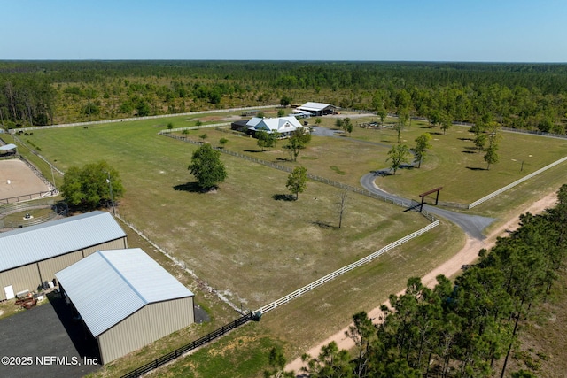 bird's eye view featuring a forest view
