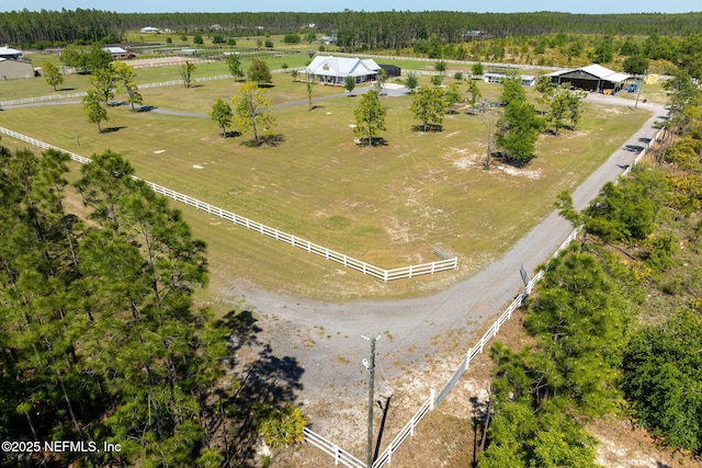 bird's eye view with a rural view and a forest view