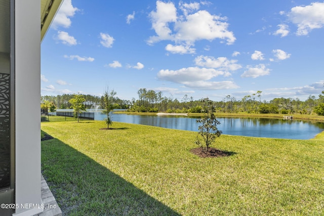 view of water feature with fence