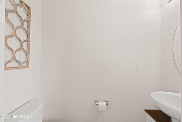 3937 Oak Mill Rd, Orange Park, FL 32065 - bathroom featuring toilet and a sink