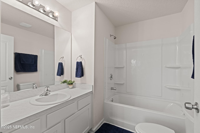 3937 Oak Mill Rd, Orange Park, FL 32065 - full bathroom with toilet, a textured ceiling, vanity, and bathtub / shower combination