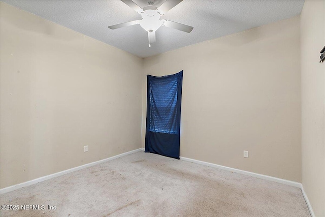 2176 Major Oak St, Jacksonville, FL 32218 - unfurnished room with baseboards, a ceiling fan, carpet floors, and a textured ceiling