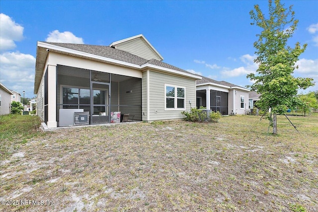 2176 Major Oak St, Jacksonville, FL 32218 - rear view of house featuring a sunroom
