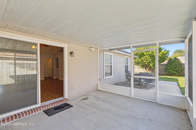 2423 Royal Pointe Dr, Green Cove Springs, FL 32043 - unfurnished sunroom featuring arched walkways