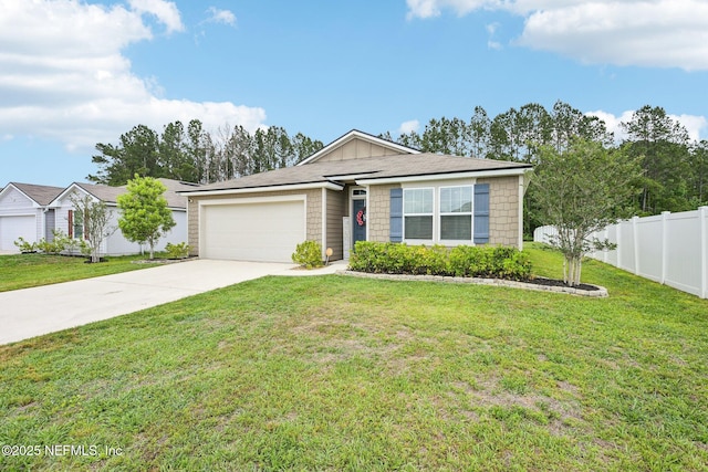 ranch-style home featuring fence, an attached garage, concrete driveway, and a front yard