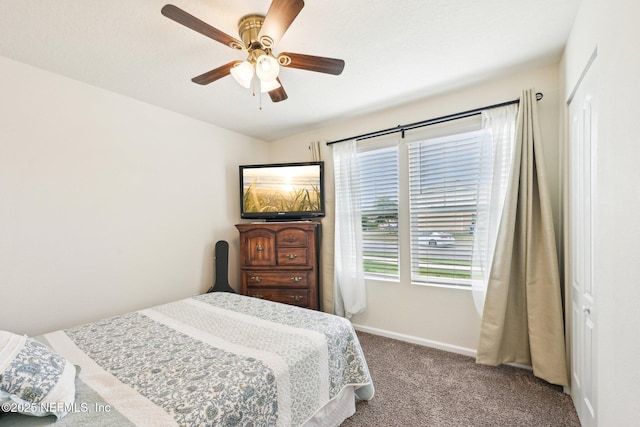 bedroom featuring baseboards, carpet, and ceiling fan