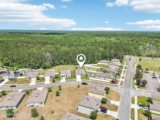 aerial view with a view of trees and a residential view