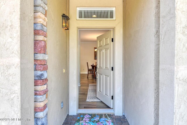 86 Amacano Ln, Saint Augustine, FL 32084 - property entrance featuring visible vents and stucco siding