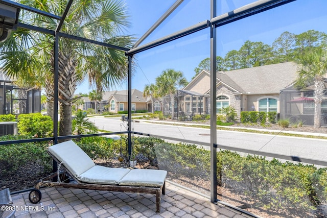 86 Amacano Ln, Saint Augustine, FL 32084 - sunroom featuring a residential view