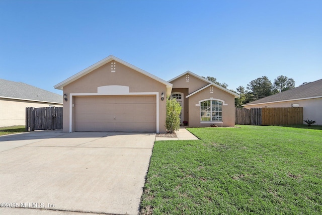 3620 Braeden Ct, Middleburg, FL 32068 - single story home featuring driveway, stucco siding, fence, and an attached garage