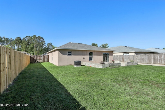 3620 Braeden Ct, Middleburg, FL 32068 - rear view of house with stucco siding, cooling unit, a patio area, a fenced backyard, and a lawn