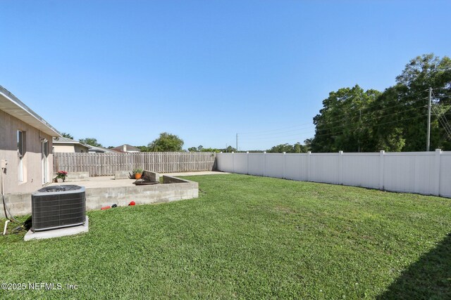 3620 Braeden Ct, Middleburg, FL 32068 - view of yard with a patio area, central AC, and a fenced backyard