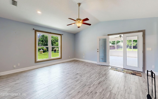 4147 Saunders Dr, Middleburg, FL 32068 - unfurnished room featuring lofted ceiling, visible vents, a ceiling fan, light wood-style floors, and baseboards
