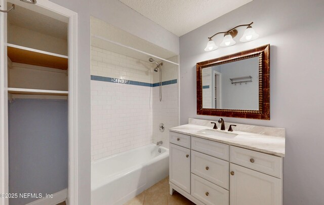 4147 Saunders Dr, Middleburg, FL 32068 - full bath featuring shower / bathtub combination, vanity, tile patterned floors, and a textured ceiling