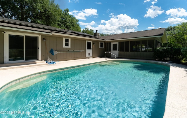 4147 Saunders Dr, Middleburg, FL 32068 - pool with a sunroom and a patio