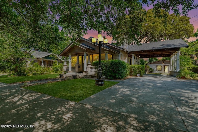 4215 Irvington Ave, Jacksonville, FL 32210 - craftsman inspired home with a yard, covered porch, and concrete driveway