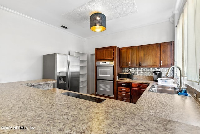 4215 Irvington Ave, Jacksonville, FL 32210 - kitchen featuring a sink, visible vents, appliances with stainless steel finishes, and crown molding