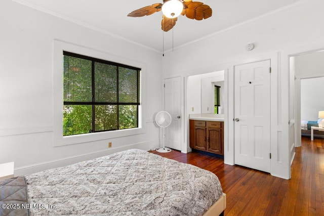 4215 Irvington Ave, Jacksonville, FL 32210 - bedroom with crown molding, dark wood-style flooring, and baseboards