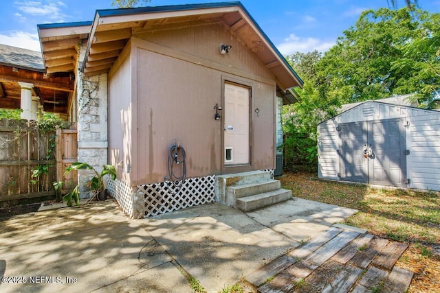 4215 Irvington Ave, Jacksonville, FL 32210 - view of shed with entry steps and fence