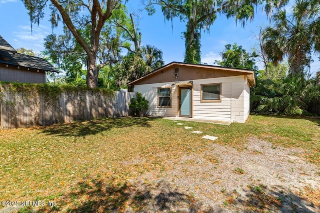 4215 Irvington Ave, Jacksonville, FL 32210 - bungalow-style house featuring a front yard and fence