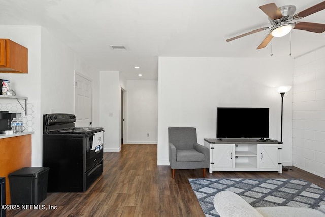 4215 Irvington Ave, Jacksonville, FL 32210 - living area with dark wood-type flooring, a ceiling fan, visible vents, recessed lighting, and baseboards