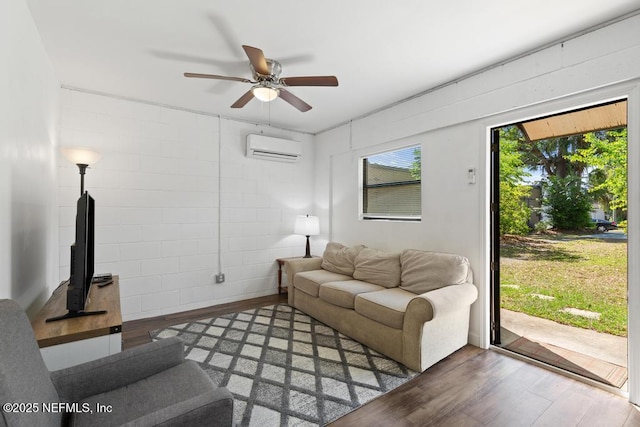 4215 Irvington Ave, Jacksonville, FL 32210 - living area with a ceiling fan, a wall mounted AC, and wood finished floors