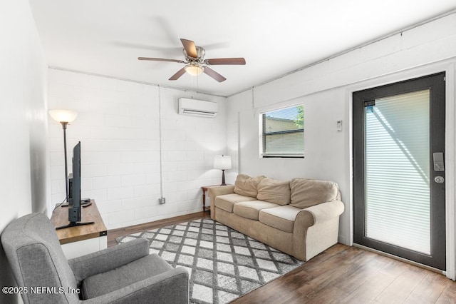 4215 Irvington Ave, Jacksonville, FL 32210 - living room with ceiling fan, wood finished floors, and a wall mounted air conditioner