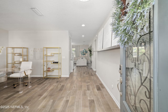 190 Palisade Dr, Saint Augustine, FL 32092 - hall with recessed lighting, visible vents, light wood finished floors, and baseboards