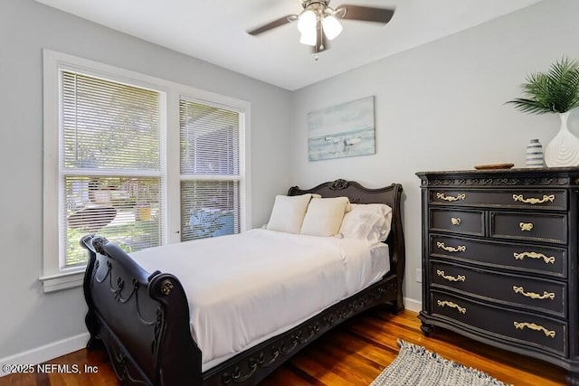 2969 Green St, Jacksonville, FL 32205 - bedroom featuring dark wood-type flooring, baseboards, and a ceiling fan