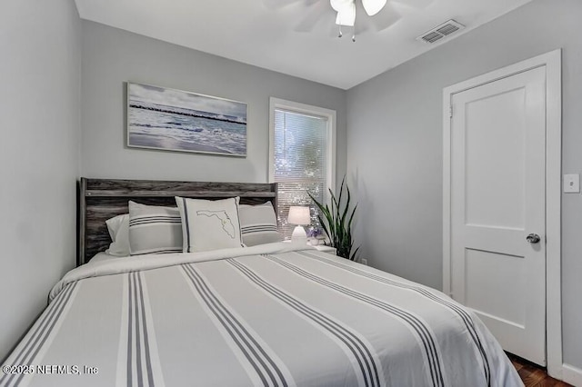 2969 Green St, Jacksonville, FL 32205 - bedroom with dark wood-type flooring, visible vents, and ceiling fan