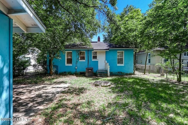 2969 Green St, Jacksonville, FL 32205 - back of house with a yard, crawl space, fence, and a chimney