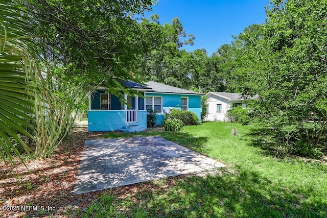 2969 Green St, Jacksonville, FL 32205 - view of front of home with a front lawn